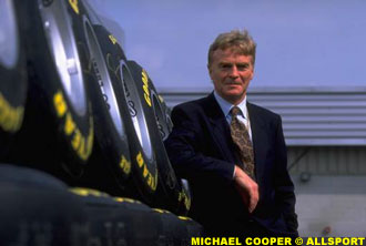 Mosley next to his favorite item: tires