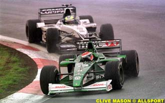 Johny Herbert leads Ralf Schumacher
