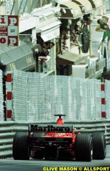 Michael Schumacher gets close to the barriers