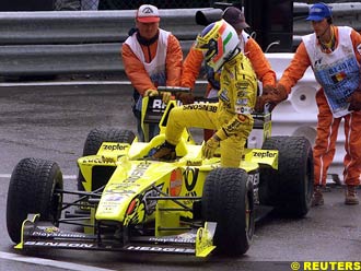 Trulli retires after being punted off by Button in Spa