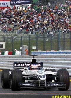 Button dominates at Suzuka