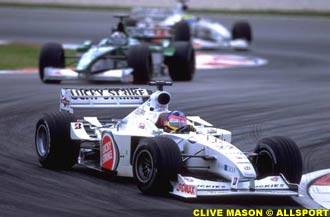 Villeneuve steers his BAR to victory at Sepang