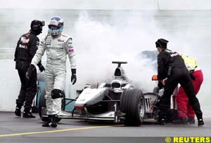 A car on fire is extinguished