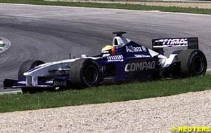 Ralf Schumacher on the grass with brake troubles
