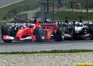 Rubens Barrichello ahead of David Coulhard