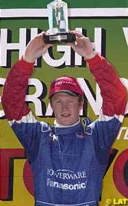 Scott Dixon with the winner's trophy at Nazareth