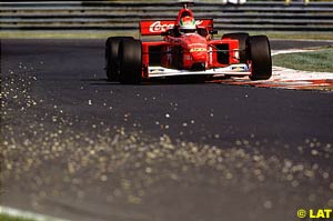 Justin Wilson drives his way to victory on a dirty Hungaroring
