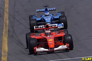 Fisichella on the tail of Barrichello