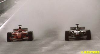 Schumacher overtakes Coulthard for the lead