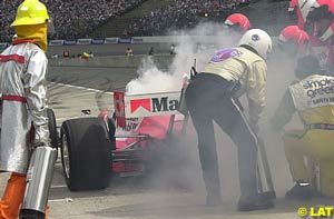 De Ferran's race goes up in smoke