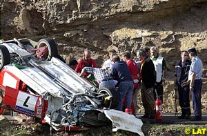 Makinen's Lancer on its roof