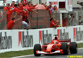 Schumacher crosses the finish line