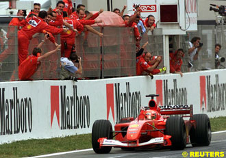 Schumacher crosses the finish line