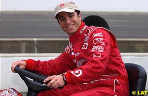 Bruno Junqueira takes the ride-on mower he won for winning pole at Indy for a spin