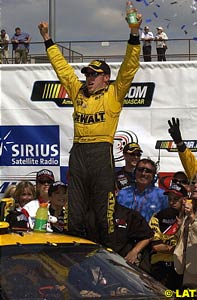 Matt Kenseth celebrates after winning at Michigan