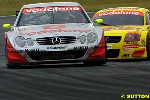Bernd Schneider leads Laurent Aiello