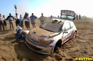 Richard Burns's wounded Peugeot