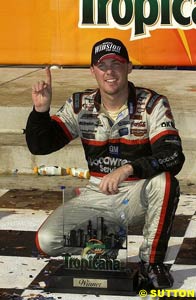 Kevin Harvick with the winner's trophy