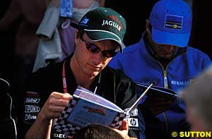 Eddie Irvine catches up on his reading