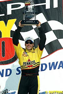 Winner Sam Hornish and the winner's trophy
