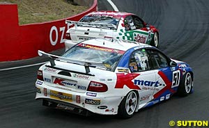 Greg Murphy and Todd Kelly paid dearly for the problem in the pits as Steven Richards and Russell Ingall's Castrol car slips through