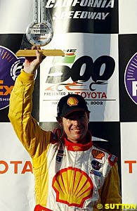 Jimmy Vasser celebrates victory