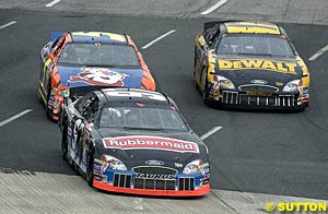 Kurt Busch battles on his way to victory