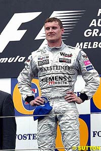 David Coulthard on top of the podium