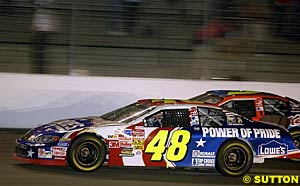 The Winston winner Jimmie Johnson battles with Terry Labonte earlier in the night