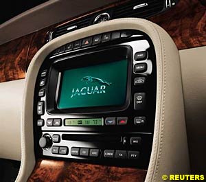 The new Jaguar XJ-R's (optional) touch-screen command centre for the satellite navigation, telephone, in-car entertainment and climate control may look like a seaside arcade game but it is very easy to use 