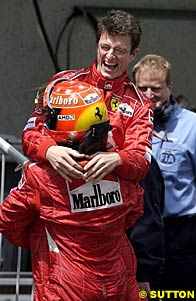 Schumacher hugs dyer