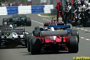 The crowded pitlane