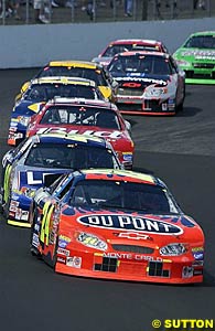 24th placed finisher Jeff Gordon led the most laps, seen here leading teammate and winner Jimmie Johnson earlier in the race