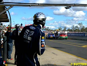 Marcos Ambrose and Steven Ellery collide in pit lane as Ambrose's SBR crew watch on in horror