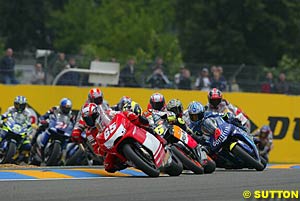 Loris Capirossi leads the way at the start of this year's French Grand Prix