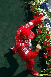 Schumacher celebrates his 4th win of 2003