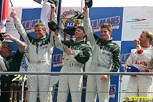 The winning trio of Tom Kristensen, Rinaldo 'Dindo' Capello and Guy Smith celebrate their victory