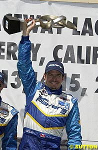 Patrick Carpentier celebrates victory at Laguna Seca