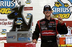 Kurt Busch with a giant 'Mongo' winner's trophy