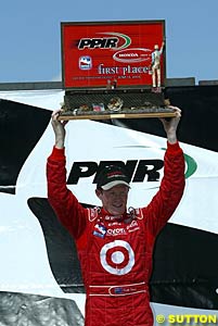 Scott Dixon with his winner's trophy at Pike's Peak