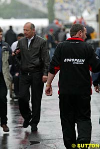 Dennis and Stoddart in the paddock