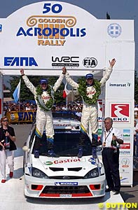 Michael Park and Markko Martin celebrate their first WRC victory