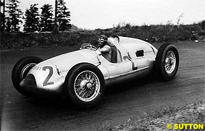 Tazio Nuvolar driving an Auto Union V12 in 1939