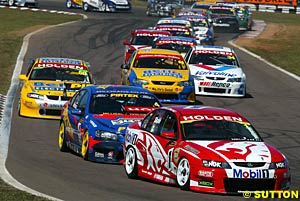 Mark Skaife leads Marcos Ambrose, Jason Bright, Paul Radisich and Garth Tander at the hairpin on lap one in race two