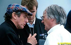 Jackie Stewart talks with Bernie Ecclestone