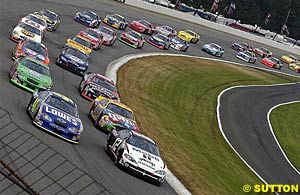 Ryan Newman and Jimmie Johnson lead the field around to take the start