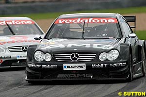 Winner Jean Alesi leads Bernd Schneider at Donington