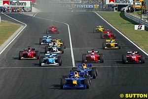 Vitantonio Liuzzi leads teammate and winner Patrick Friesacher at the start of the race