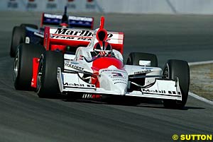 Winner and points leader Helio Castroneves