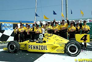 Sam Hornish celebrates with his crew after his first victory for the season